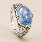 Offener Aquamarin Cabochonring mit durchbrochenen Ornamenten