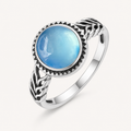 Aquamarin Ring aus 925er Silber mit Zackenrahmen und Flechtmuster