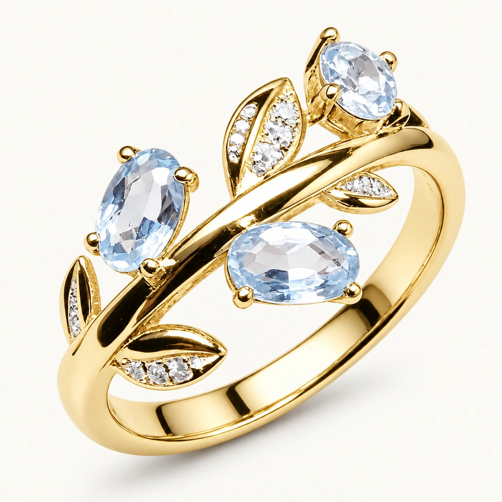 Aquamarin Ring Goldoptik aus 925er Silber mit drei ovalen Steinen und Blättern