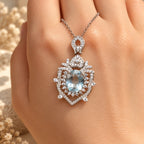 Aquamarin Kette aus 925er Silber mit ovalem Stein und ornamentalem Anhänger