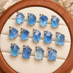 Aquamarin Kette aus 925er Silber mit facettiertem Stein und geschwungener Fassung