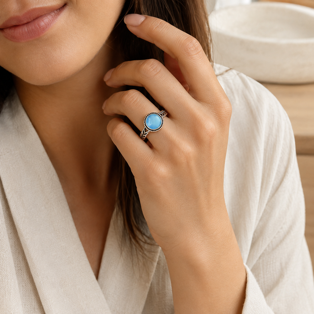 Aquamarin Ring aus 925er Silber mit Zackenrahmen und Flechtmuster