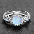 Opal Ring aus 925er Silber mit floralem Steinbesatz