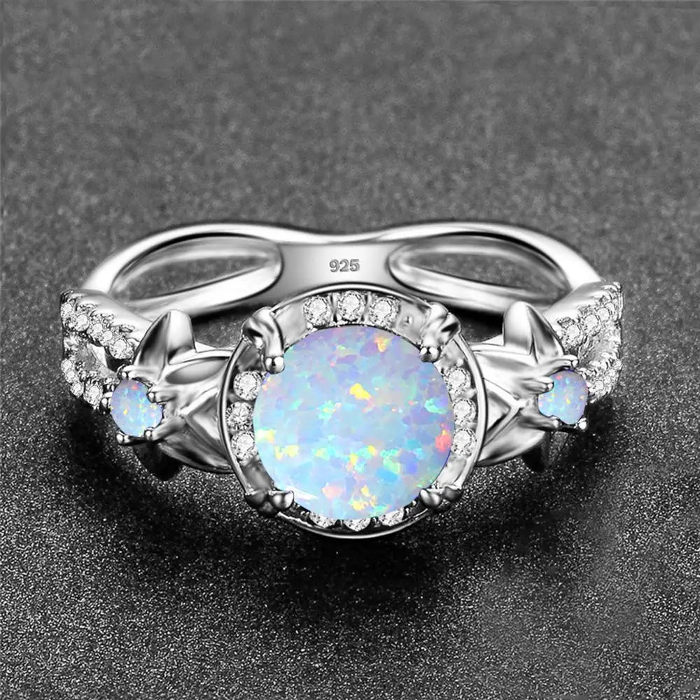 Opal Ring aus 925er Silber mit floralem Steinbesatz