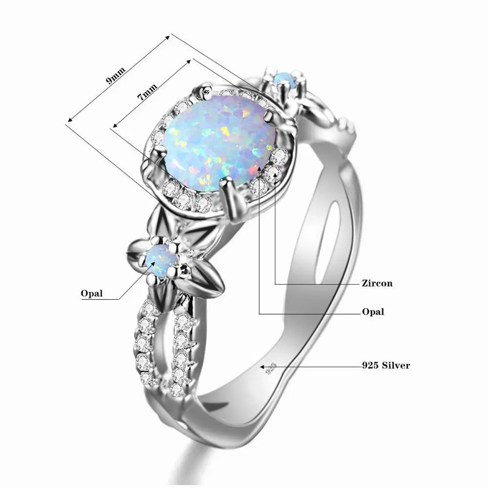 Opal Ring aus 925er Silber mit floralem Steinbesatz