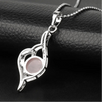 Rosenquarz Kette mit rundem Stein und Blätterornament