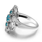 Aquamarin-Ring mit drei Steinen und filigranen Ornamenten