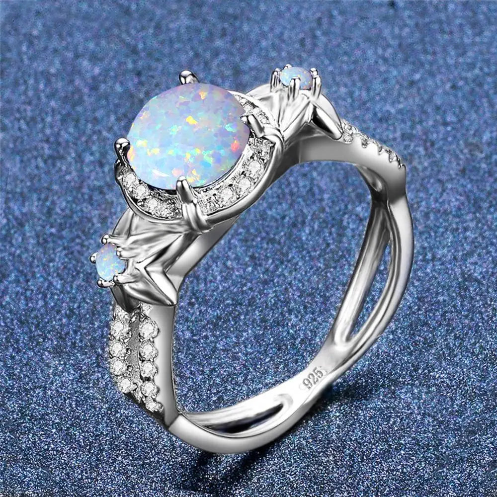 Opal Ring aus 925er Silber mit floralem Steinbesatz