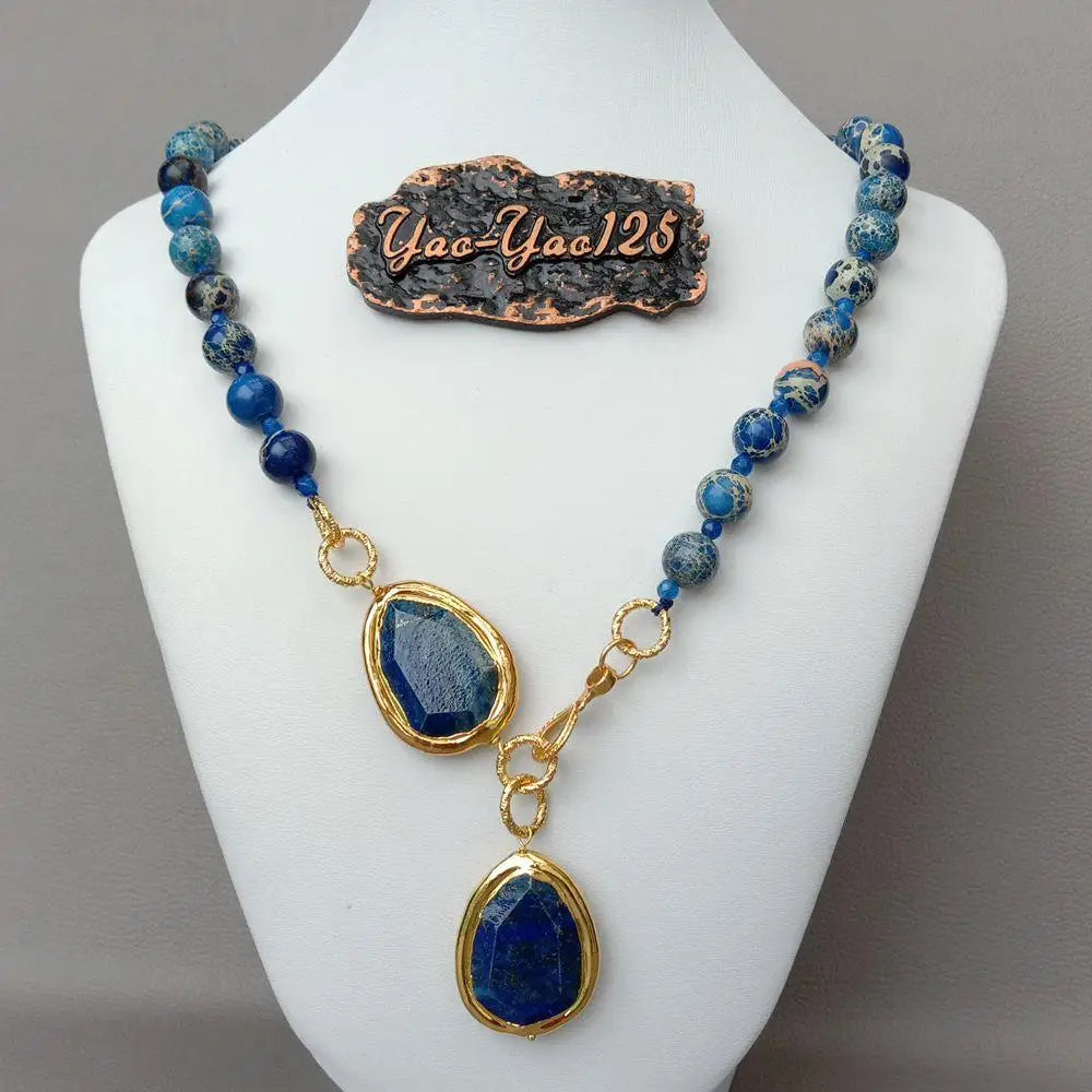 Lapislazuli Halskette mit facettierten Tropfenanhängern und Goldakzenten