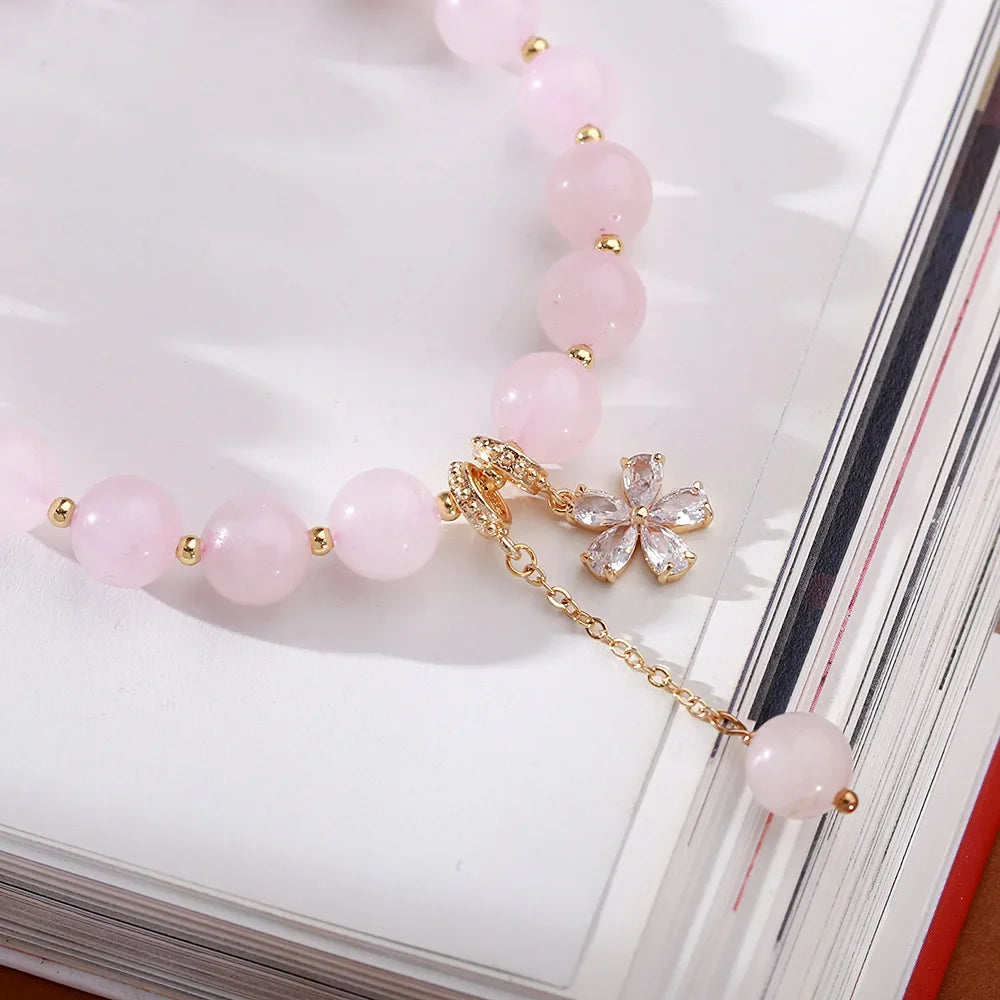 Rosenquarz Perlenarmband mit Blumenanhänger