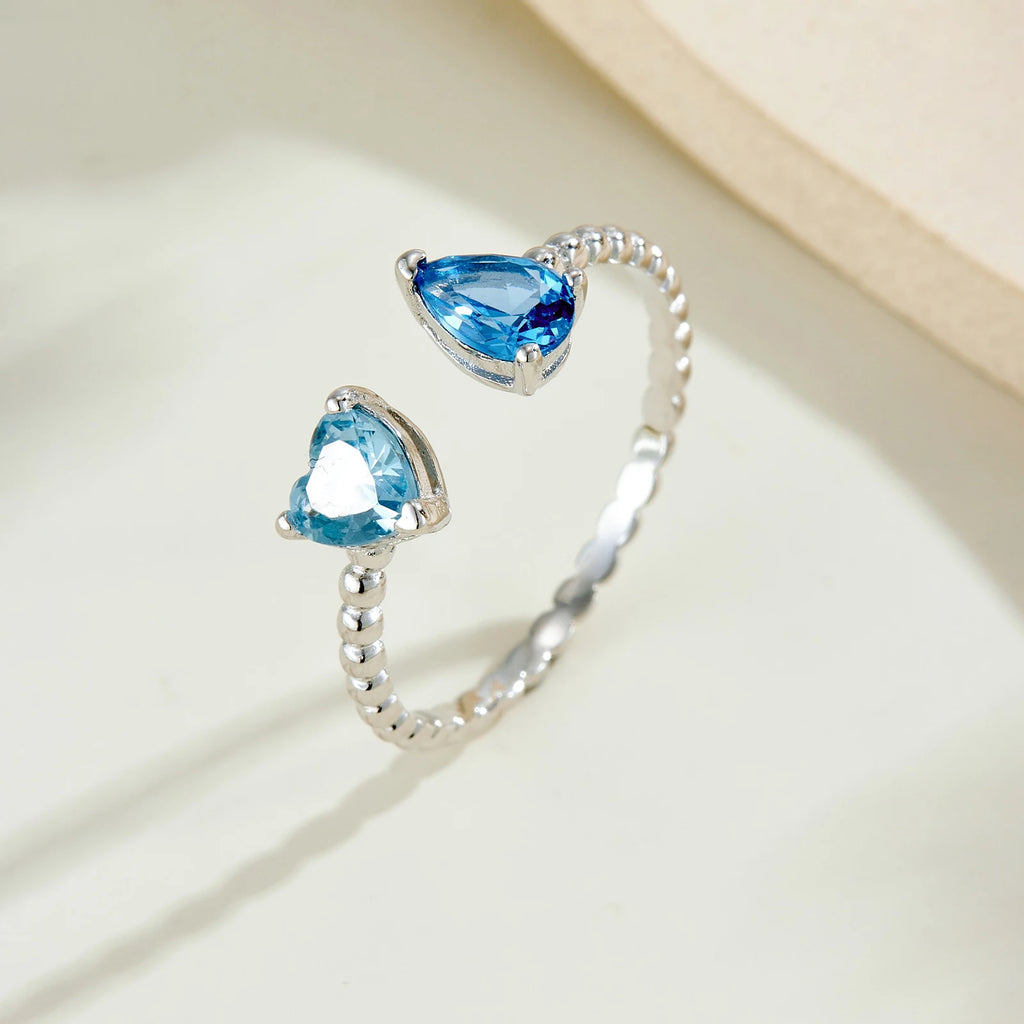 Offener Ring mit Aquamarin aus 925er Silber mit zwei tropfenförmigen Steinen