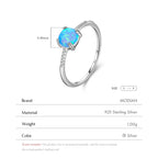 Blauer Opal Ring aus 925er Silber mit rundem Stein und Steinbesatz