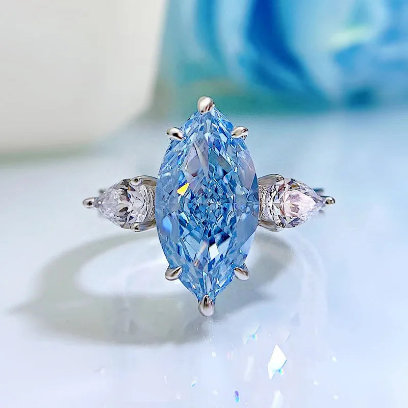Ring Aquamarin Silber aus 925er Silber mit großem Navette-Stein und Seitensteinen