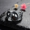 Offener Onyx Ring aus 925er Silber mit Spiralornamenten
