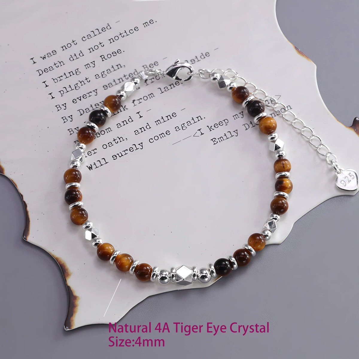 Feines Tigerauge Armband mit facettierten Metallperlen