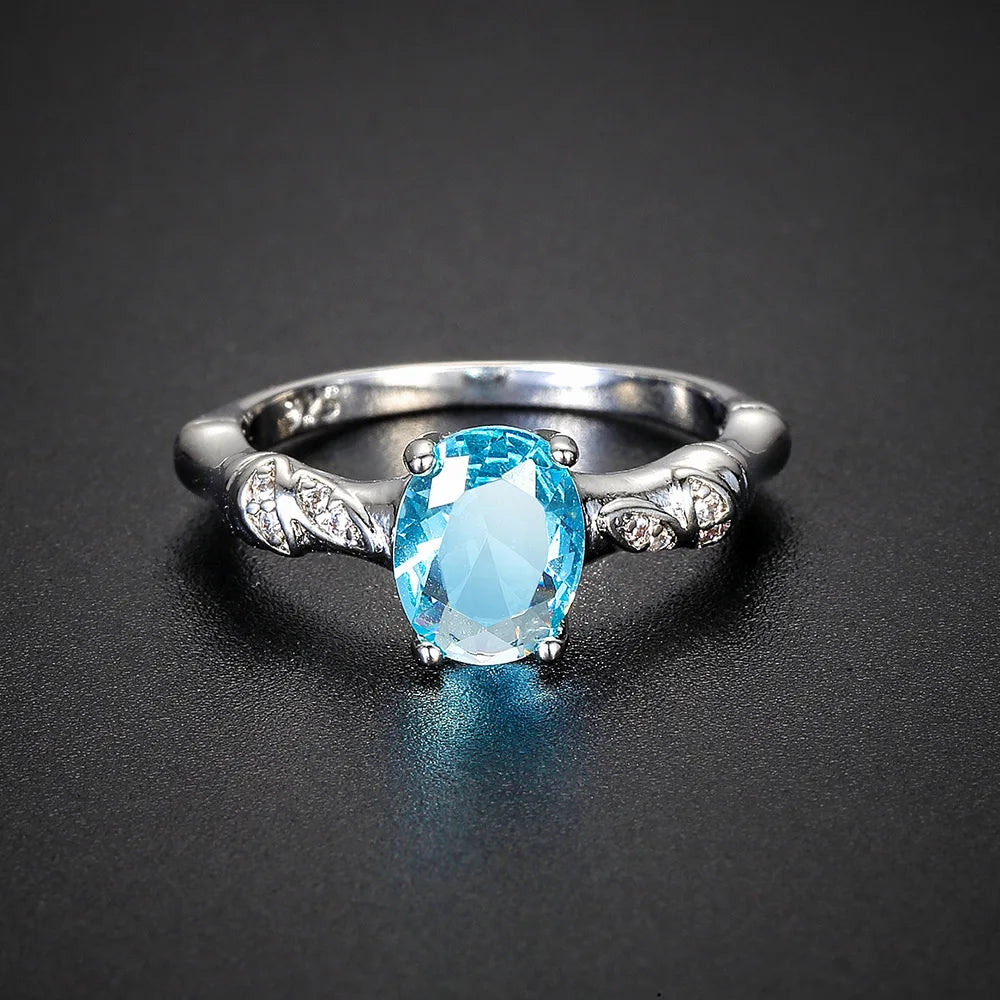 Aquamarin Look Ring mit ovalem Stein und Blattornamenten