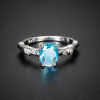 Aquamarin Look Ring mit ovalem Stein und Blattornamenten
