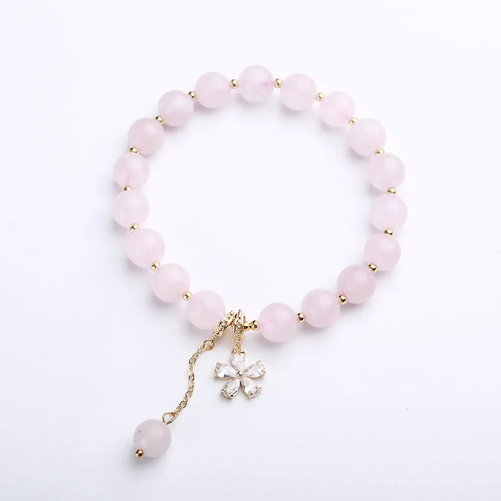 Rosenquarz Perlenarmband mit Blumenanhänger