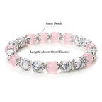 Rosenquarz-Howlit Armband mit ornamentalen Perlenkappen