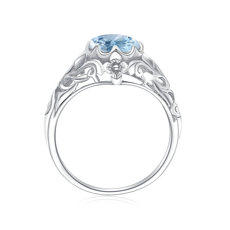 Aquamarin Ring antik aus 925er Silber mit rundem Stein und reich verzierten Seiten