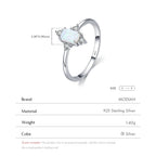 Opal Ring aus 925er Silber mit ovalem Stein und vier Ziersteinen