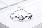 Florales Mondstein Armband mit Blattornamenten