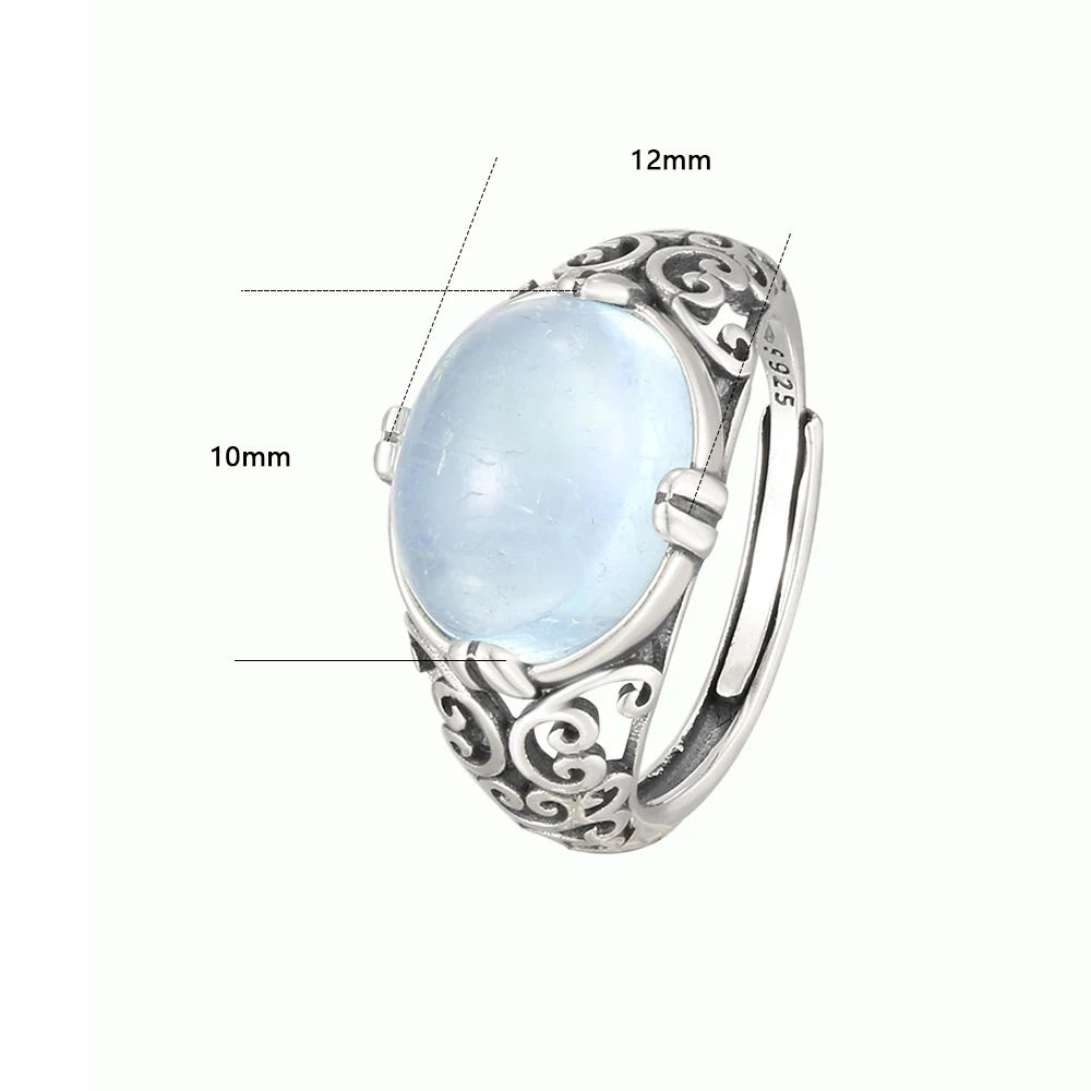 Offener Aquamarin Cabochonring mit durchbrochenen Ornamenten