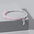 Rosenquarz Armband mit Silberperlen und Federanhänger