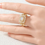 Opal Look Ring mit rechteckigem Mittelstein und Steinrahmen