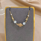 Mondstein Armband mit Muschel und Seestern