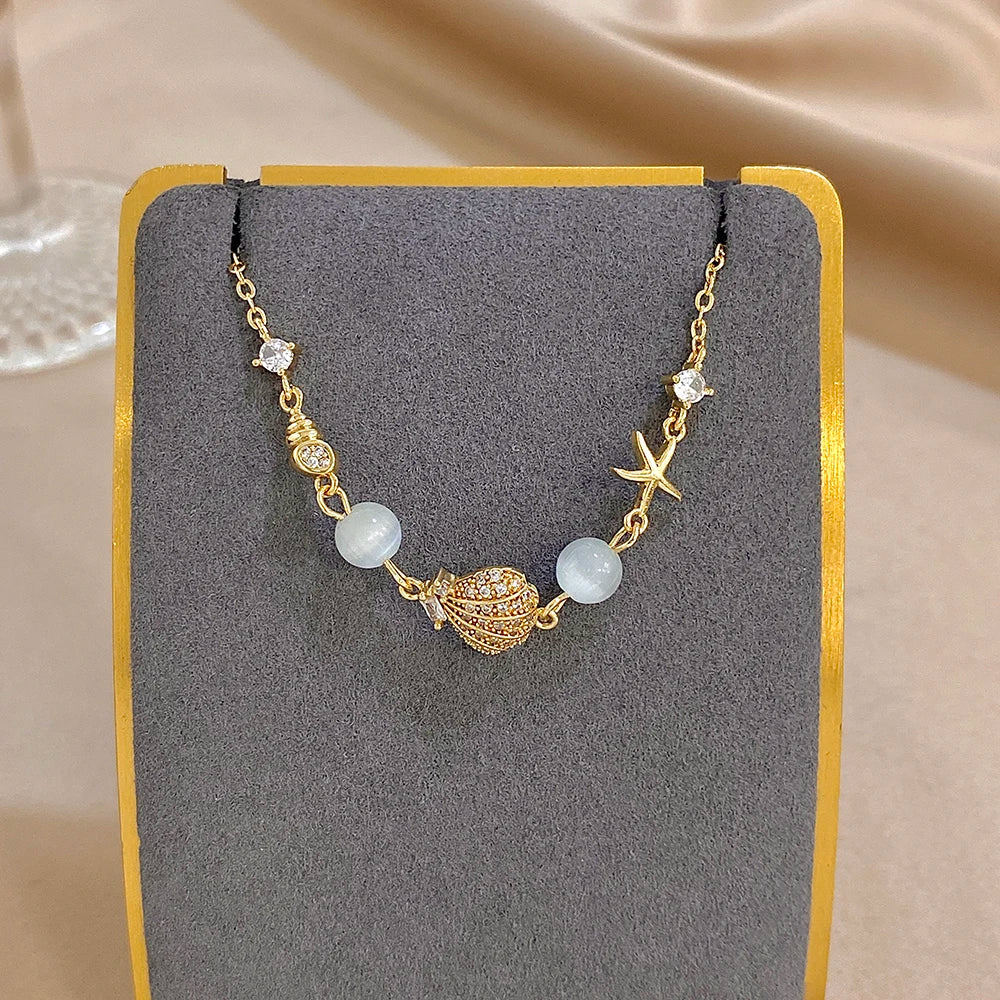 Mondstein Armband mit Muschel und Seestern