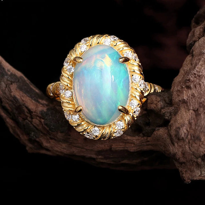 Opal Ring aus 925er Silber und Gold mit großem ovalem Stein