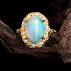 Opal Ring aus 925er Silber und Gold mit großem ovalem Stein