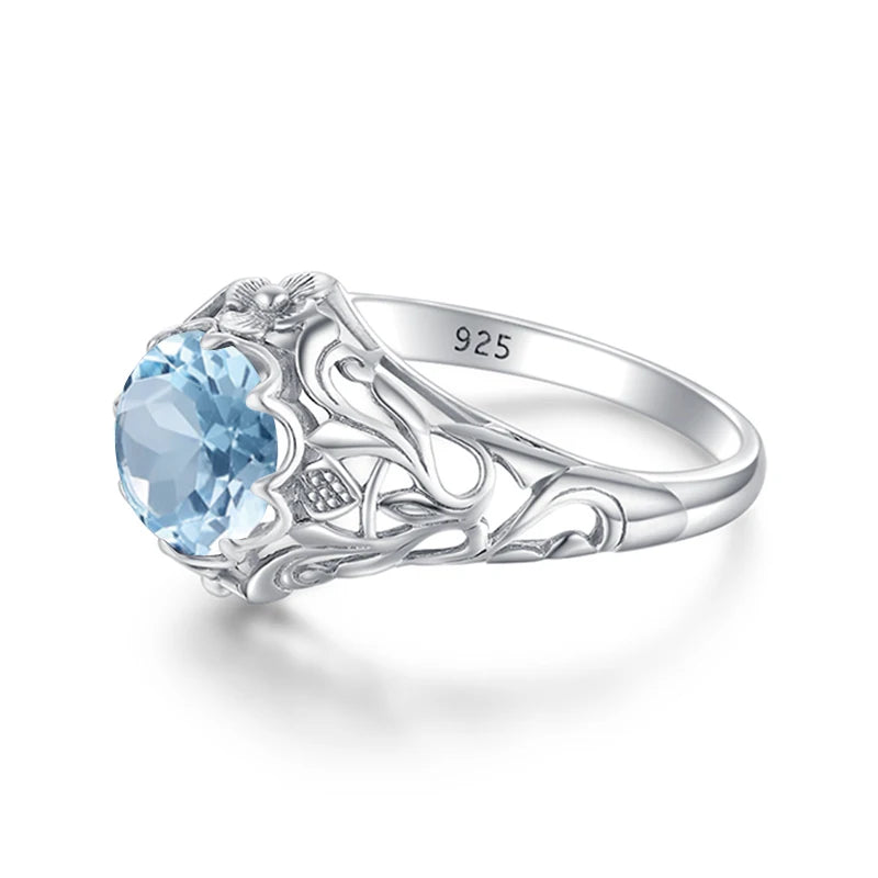 Aquamarin Ring antik aus 925er Silber mit rundem Stein und reich verzierten Seiten