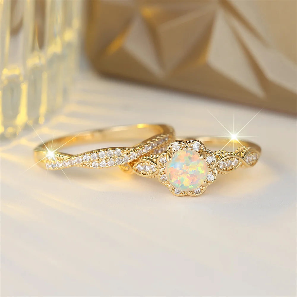 Opal Ring mit rundem Stein und Blütenkranz