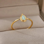 Filigraner Opal Ring mit tropfenförmigem Stein