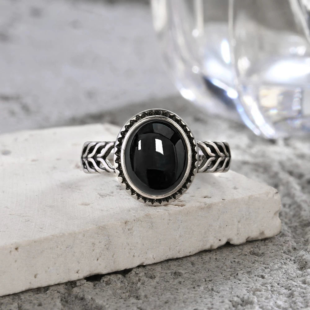 Onyx Ring aus 925er Silber mit ovalem Cabochon und Blattmuster