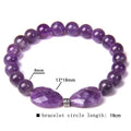 Amethyst Perlenarmband mit zwei facettierten Steinen