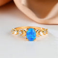Blauer Opal Goldring mit Mondsichel-Motiven
