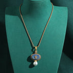 Lapislazuli Kette im Vintage-Stil mit ovalem Medaillon und Perle