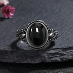 Vintage Onyx Ring aus 925er Silber mit Flechtkranz