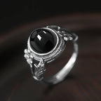 Onyx Ring aus 925er Silber mit floralen Details