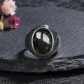 Onyx Siegelring aus 925er Silber mit ovalem Cabochon und Strukturrahmen