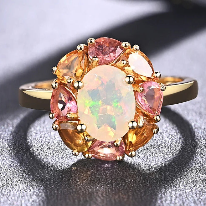 Opal Ring Gold mit Tourmalin-Kranz