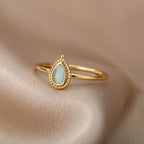 Filigraner Opal Ring mit tropfenförmigem Stein