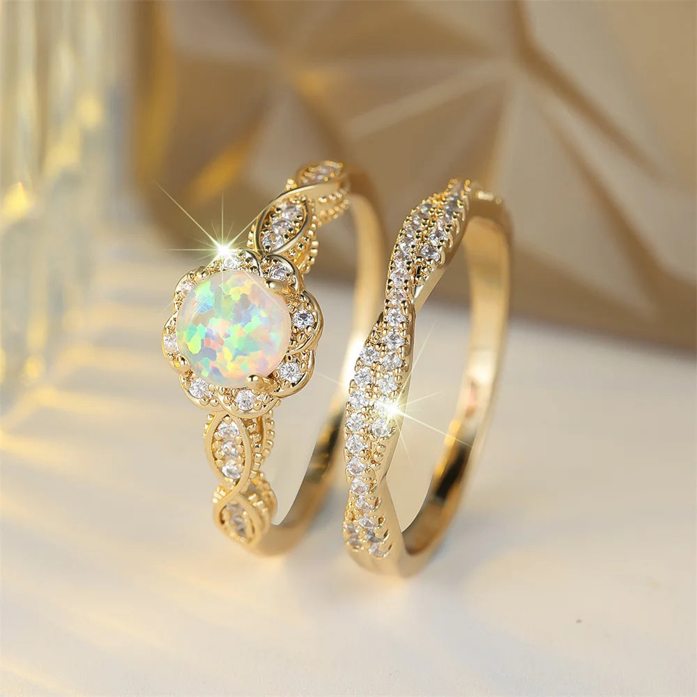 Opal Ring mit rundem Stein und Blütenkranz