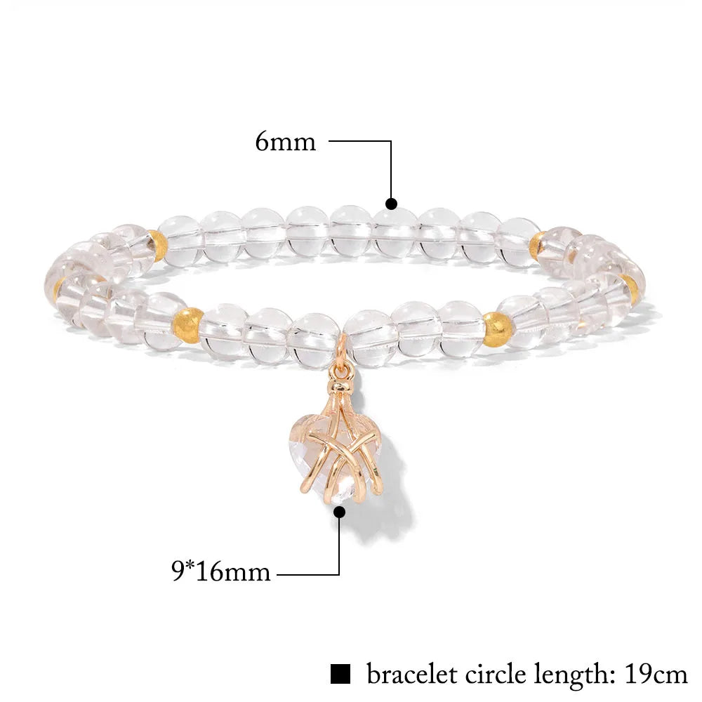 Rosenquarz Perlenarmband mit Ballerina-Anhänger