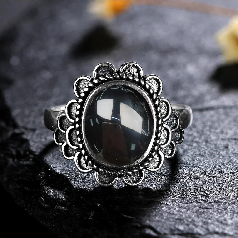 Floraler Onyx Ring aus 925er Silber im Blütenkranz-Design