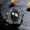 Floraler Onyx Ring aus 925er Silber im Blütenkranz-Design