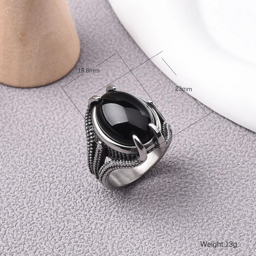 Onyx Ring mit großem ovalem Cabochon und Krappenfassung